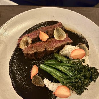 Little Bull signature dishes Hanger Steak, Charred Octopus, Lamb Ribs, Grilled Oysters